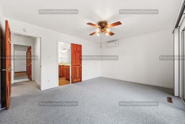 Building Photo - Look No Further, this home has it all- Hot Tub, Sauna, EV Charger, Solar, KOI Pond & More