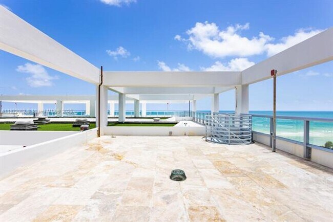 Building Photo - 6799 Collins Ave