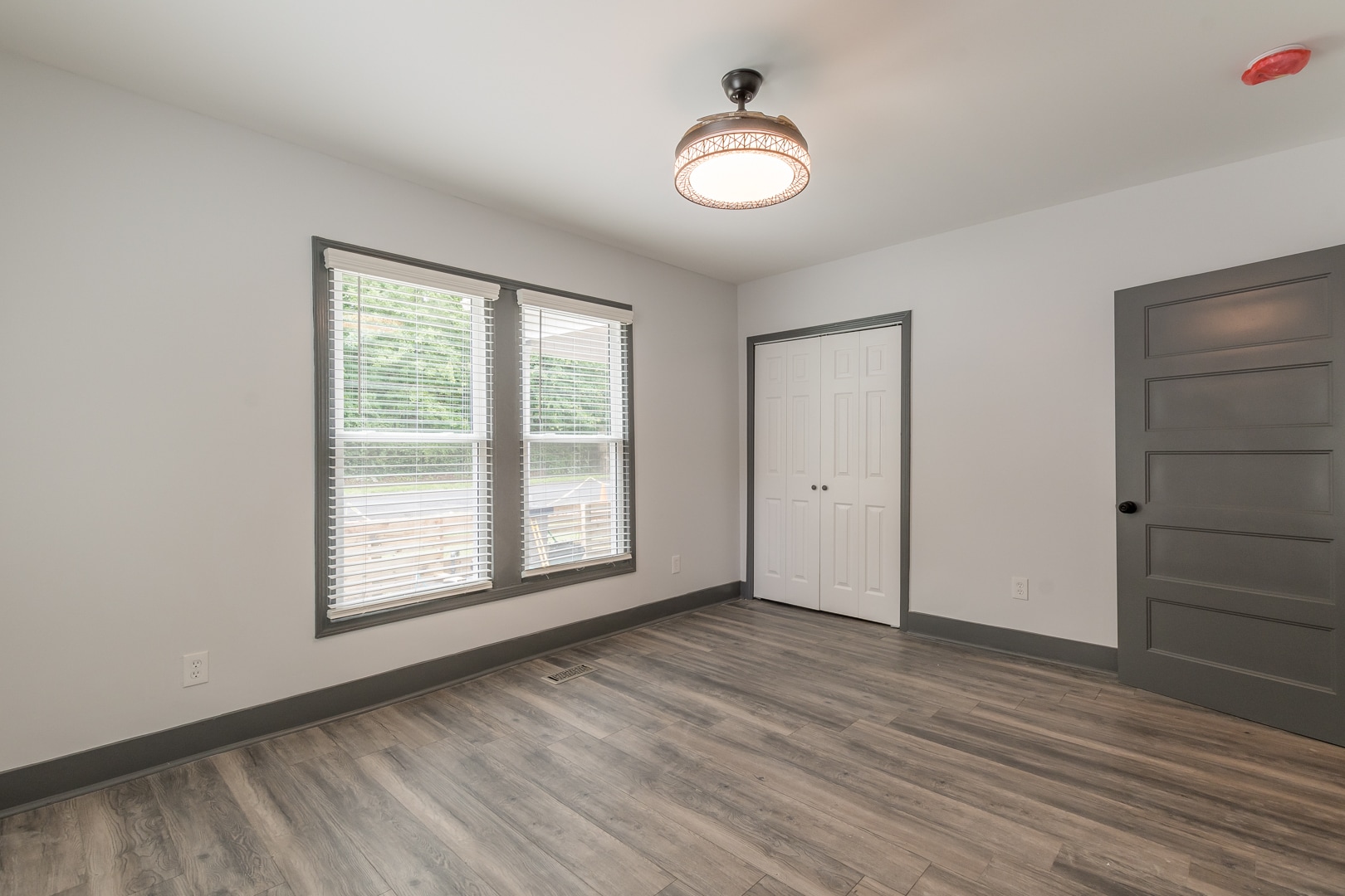 Bedroom one with retractable blade ceiling fan - 1393 Westview Dr SW