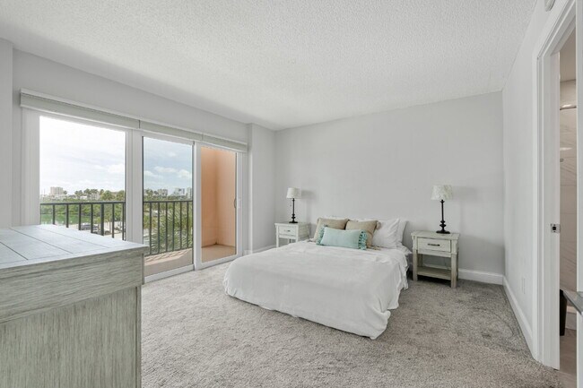 Building Photo - NEWLY RENOVATED TWO BEDROOM CONDO IN WATERFRONT RESORT STYLE COMMUNITY