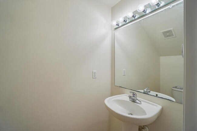 Building Photo - THREE BEDROOM TOWNHOME WITH GARAGE ACROSS FROM SHOPPING AND DINING