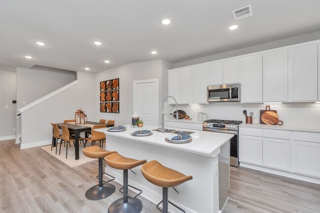 Building Photo - Welcome to the Juniper — Smart Design, Effortless Style.
