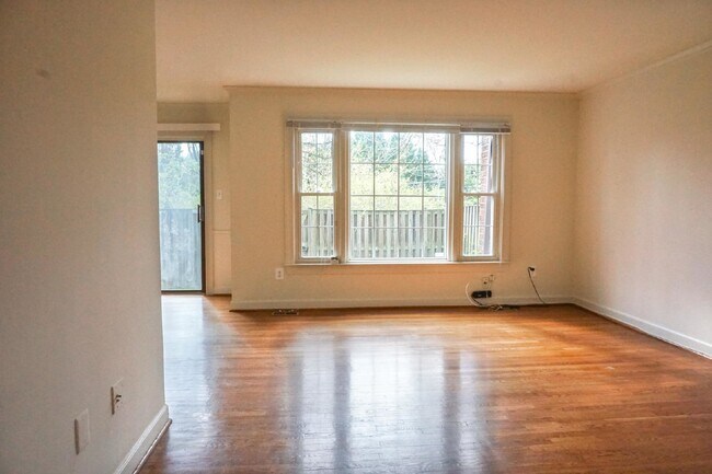 Building Photo - Beautiful brick townhome featuring three f...