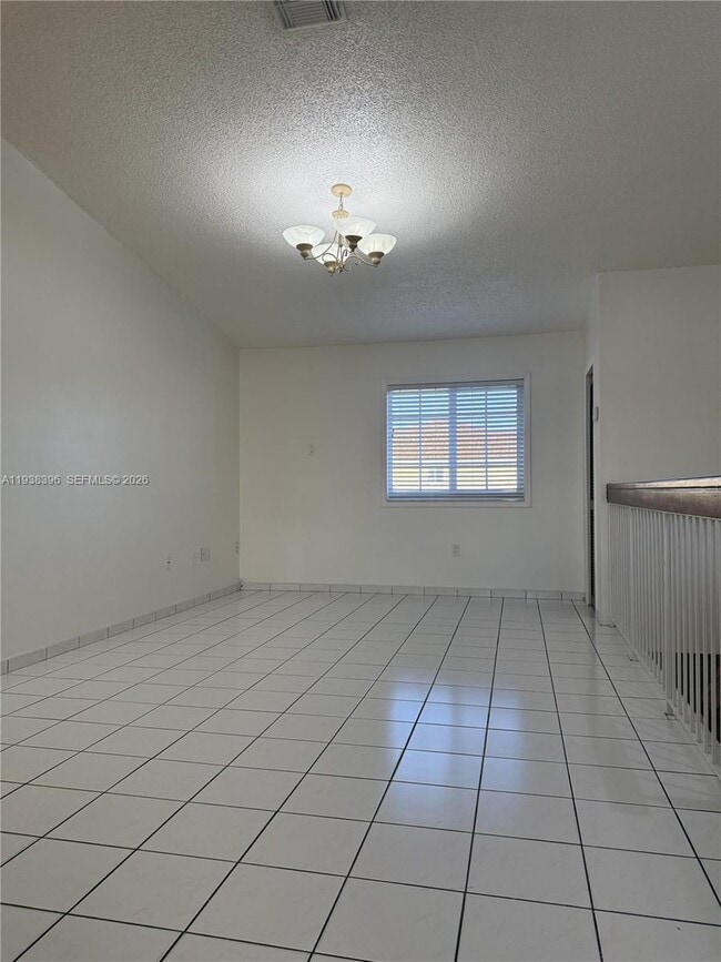 Building Photo - 10101 W Okeechobee Rd