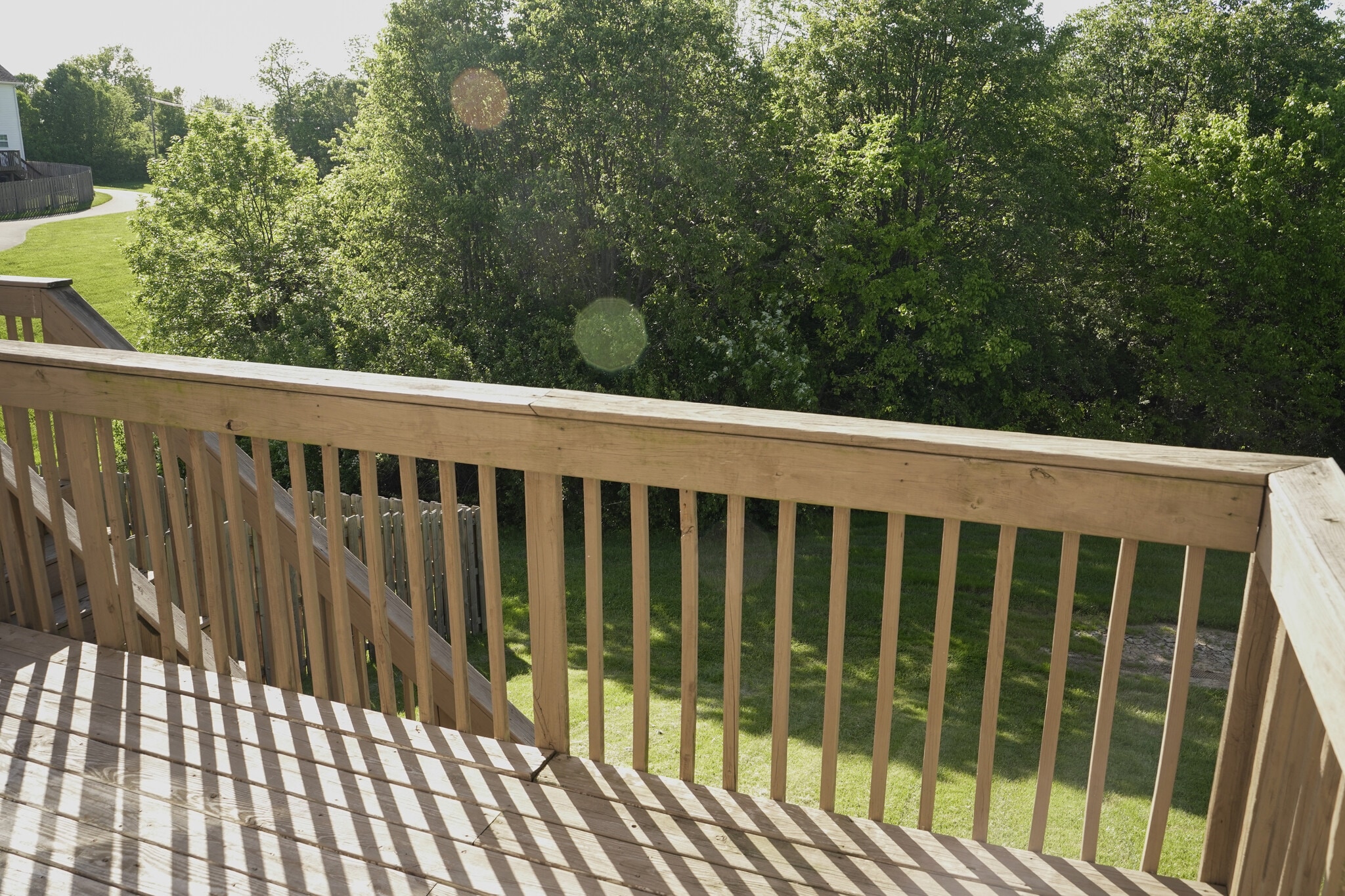 First Floor Raised Deck looking out Over Wooded Area - 393 Hays Blvd