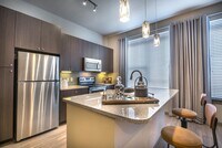 Building Photo - Modern Design Meets Everyday Luxury