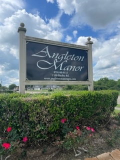 Property Sign - Angleton Manor