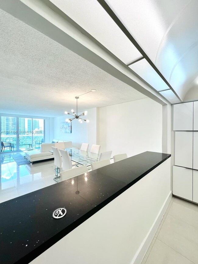 Building Photo - 19370 Collins Ave