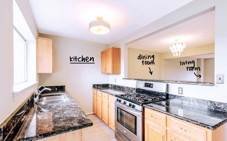 Kitchen cabinets are now white. - 4767 Kandel Ct