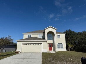 Building Photo - GORGEOUS, Large Completely Renovated Two-Story 4/2.5 PLUS LOFT in POINCIANA VILLAGES!