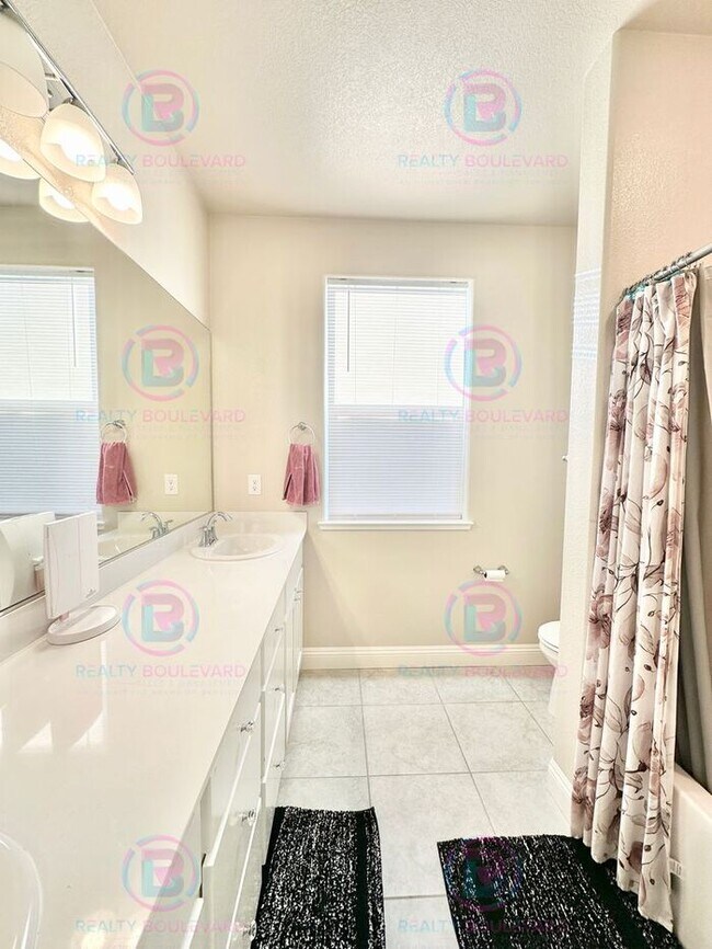 Building Photo - Welcome to your dream home, where modern elegance meets unparalleled convenience!