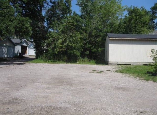 Parking area off of alley - 1209 E 4th St