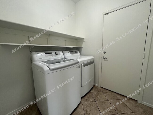 Building Photo - Well-Priced 3-Bedroom Plus Den in Gated Ru...