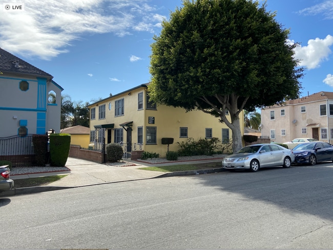 Exterior Yellow with Green Trim - 10221 S 8th Ave
