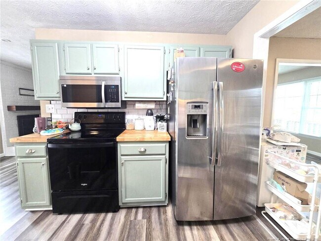 Building Photo - 6873 Brasswood Dr