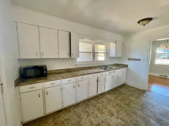 Building Photo - Welcome to this adorable 3-bedroom, 2-bath ranch style brick home, nestled in the historic McCror...