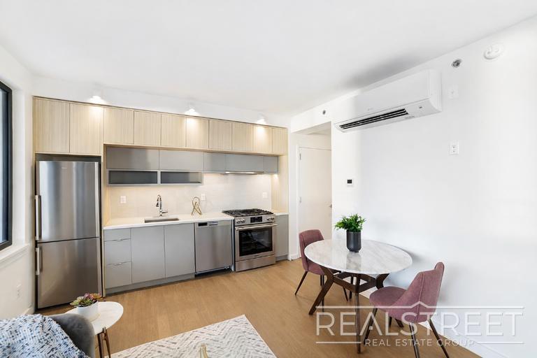 Building Photo - NO FEE Luxury Waterfront 2 Bedroom with wrap around terrace!