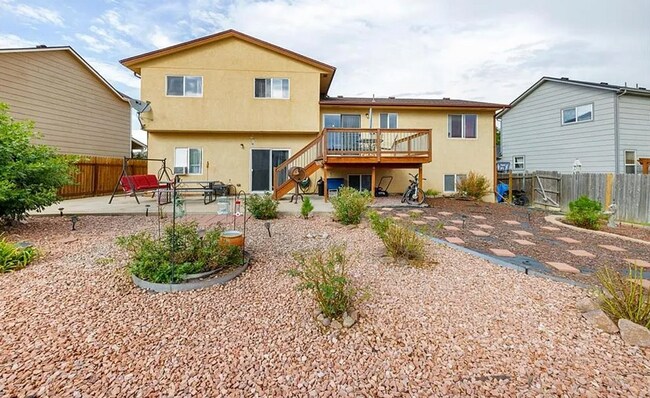 Building Photo - Spacious 5-Bedroom Home with Bonus Entertainment Room & Low-Maintenance Yard