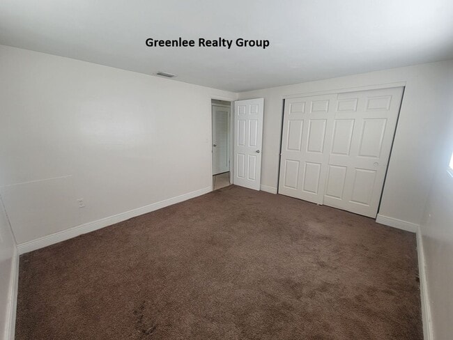 Building Photo - Spacious 3 bed, 2 bath home with fenced yard, screened porch, and oversized garage just minutes f...