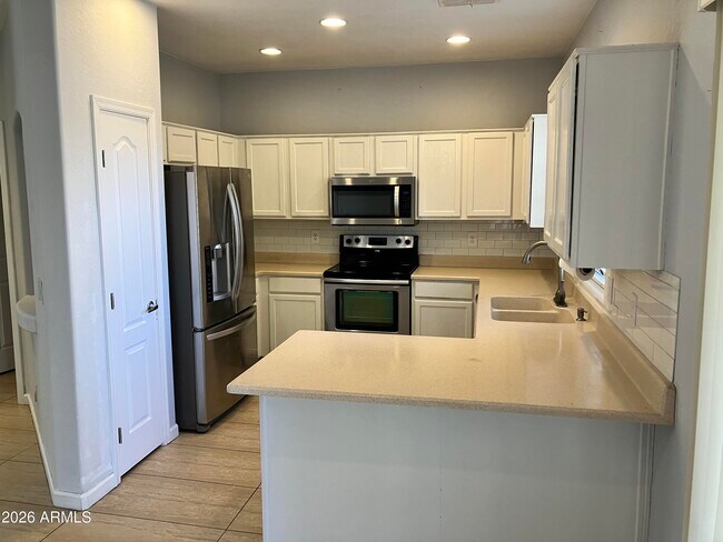 Building Photo - 7392 W Tierra Buena Ln