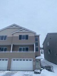 Building Photo - Stunning 3 Bed/2.5 Bath Eagle River Townhome with Unmatched Views!