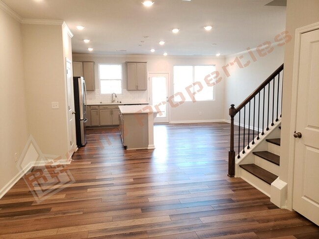 Building Photo - Brand New 3 BR 1-Car Garage Townhome in Do...