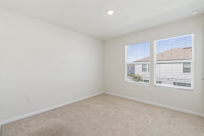 Building Photo - Oakleaf Plantation 3-Bedroom Townhouse in Towering Oaks – Spacious 1450 Sq Ft Living with 2 Full ...