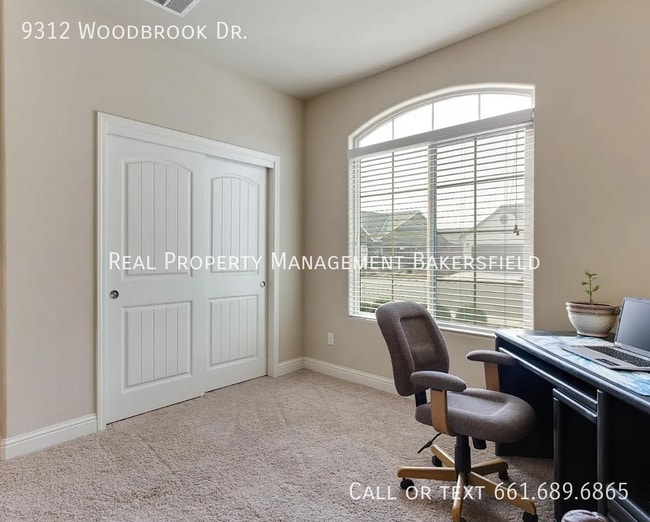 Building Photo - 9312 Woodbrook Dr