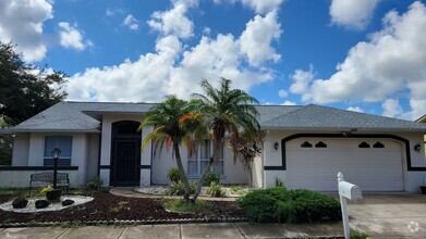 Building Photo - PENDING LEASE-Annual unfurnished 4/2 SFH i...