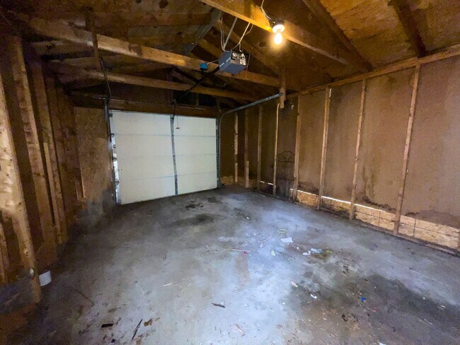 Building Photo - Fall into this cozy 3-Bedroom Home with a fenced in yard & detached garage!