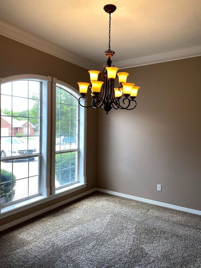 Building Photo - FABULOUS THREE BEDROOM HOME WITH LARGE DECK, FIREPLACE AND FLEX ROOM