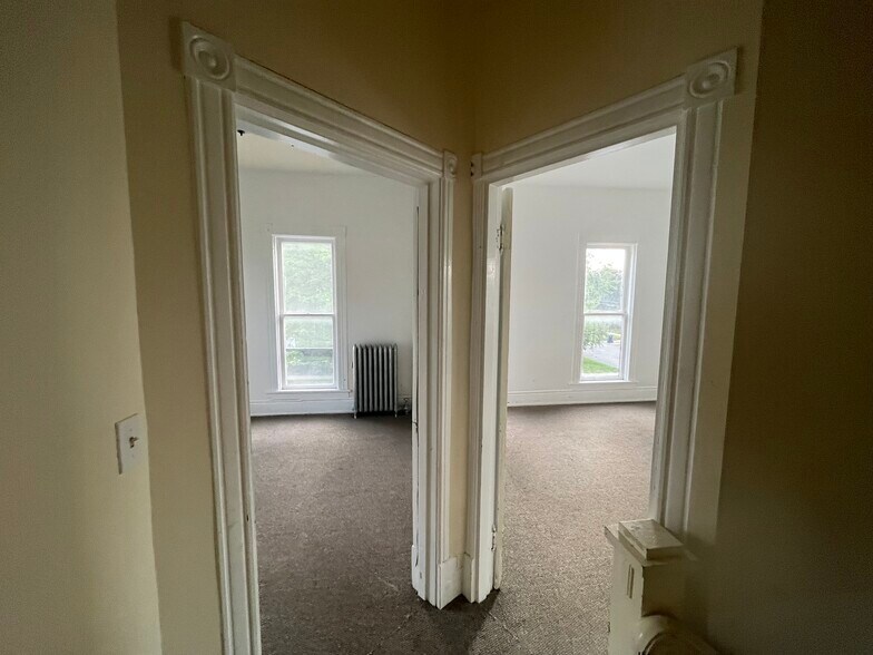 Top of stairs looking into the two bedrooms - 816 N Sheridan St