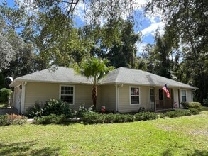Building Photo - 3BR/2BA Home with 2 Car Garage, Fenced Yard & RV Hookups – Lake City, FL