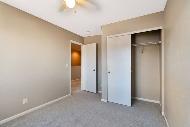 Building Photo - 3BR Townhome Near DIA & Light Rail | New Carpet, Garage & Fenced Patio