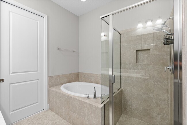 Building Photo - Move In Ready End Unit Townhome in Laureate Park | 3 Bed | Tesla Charger