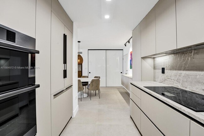 Building Photo - 5555 Collins Ave