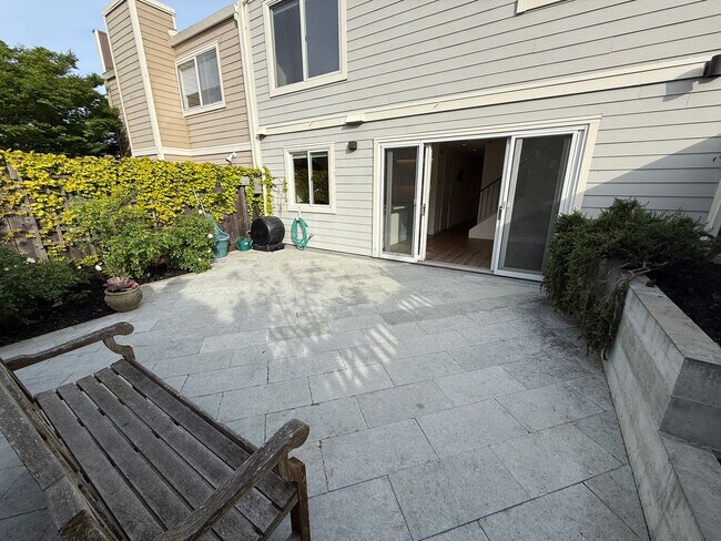 Building Photo - STUNNING THREE BEDROOM PLUS OFFICE MARINER GREEN CONDO WITH GREAT OUTDOOR SPACE