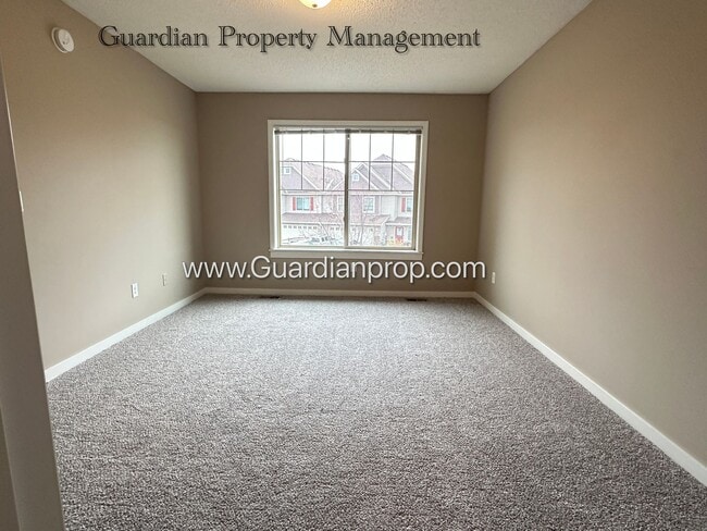 Building Photo - North Brooklyn Park Town Homes, Dedicated Office, 2 Car Garage, Washer/Dryer, Front Patio