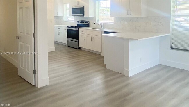 Building Photo - 2 br, 2 bath House - 1005 NE 2nd St # 1