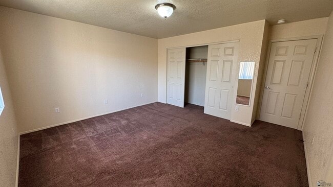 Building Photo - 8573 E 25th St