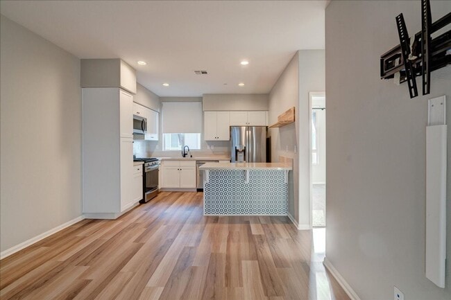Building Photo - Modern, Energy Efficient & New 3 BD/3BA + Loft Townhome