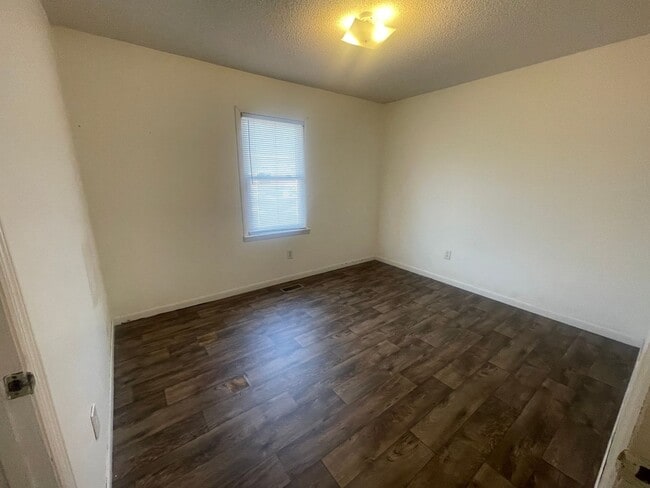 Building Photo - Brick Ranch- Dunn- 4 bedroom 2.5 bath- 2 car carport- Corner Lot