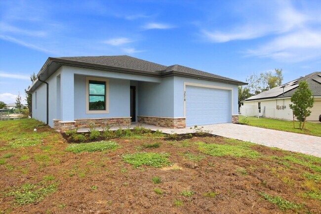 Building Photo - Brand New Canal-Front Pool Home for Rent, 3/2/2, NE Cape Coral. The Builder Didn't Cut Corners, S...