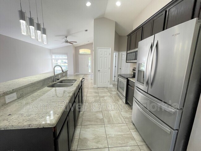 Building Photo - 5240 Mango Fruit St