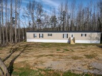 Building Photo - 6835 Catchall Rd