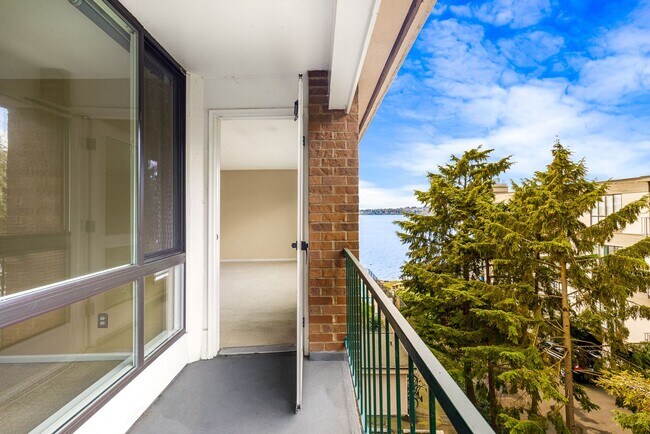 Building Photo - Waterfront Serenity: 1 Bedroom 1 Bathroom Luxury Living with Dock Access