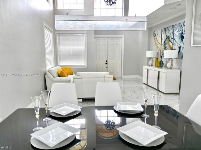 Building Photo - 3 br, 2.5 bath House - 8910 NW 45th Ct # 0