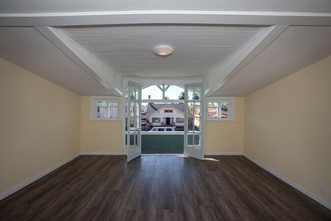 Bedroom 1 w/ Balcony, French Doors - 1075 1/2 Leighton Ave.