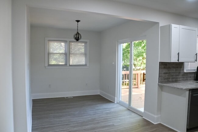 Spacious dining area leading to large back porch - 2429 Remount Rd