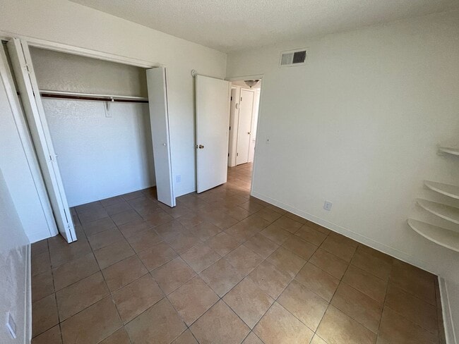 Building Photo - Two Bedroom With A/C, Fenced Yard and Wash...